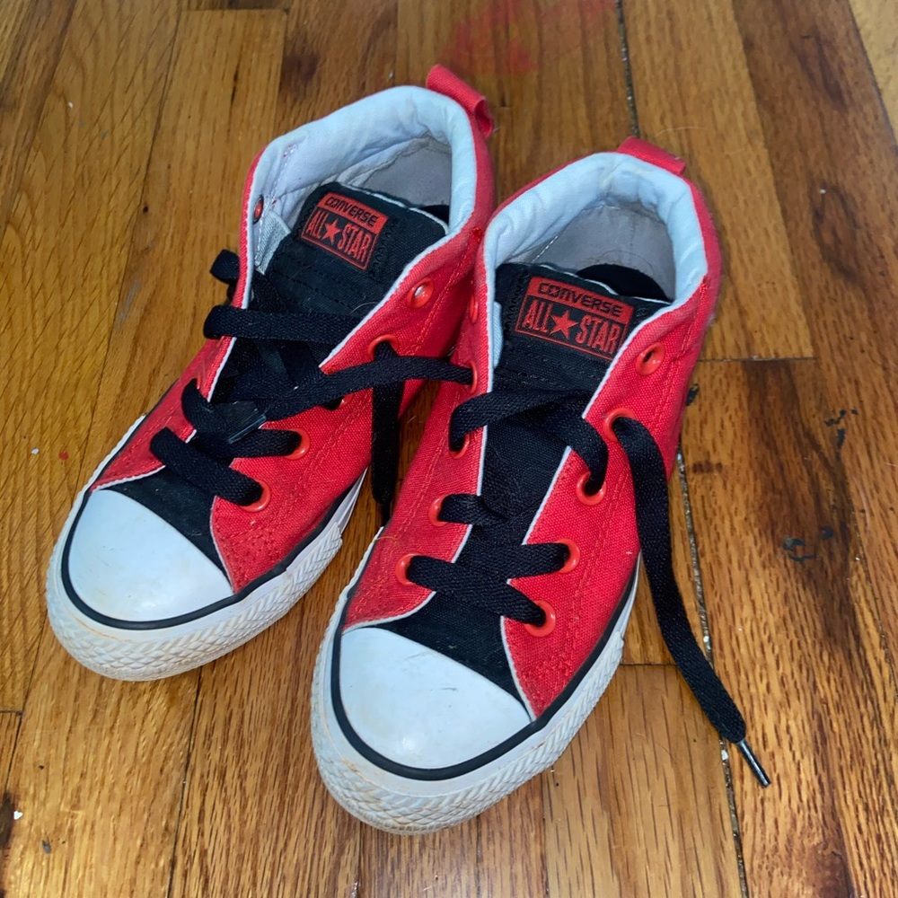 Red and black high top converse